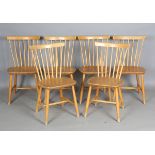 A set of six mid-20th century Swedish beech framed stick back kitchen chairs of retro design, height