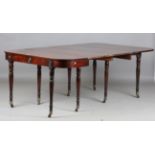 A 19th century mahogany fold-over concertina-action dining table, in the manner of Wilkinson of