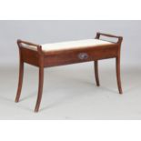 An early 20th century mahogany duet box seat piano stool, height 57cm, width 94cm, depth 36cm.