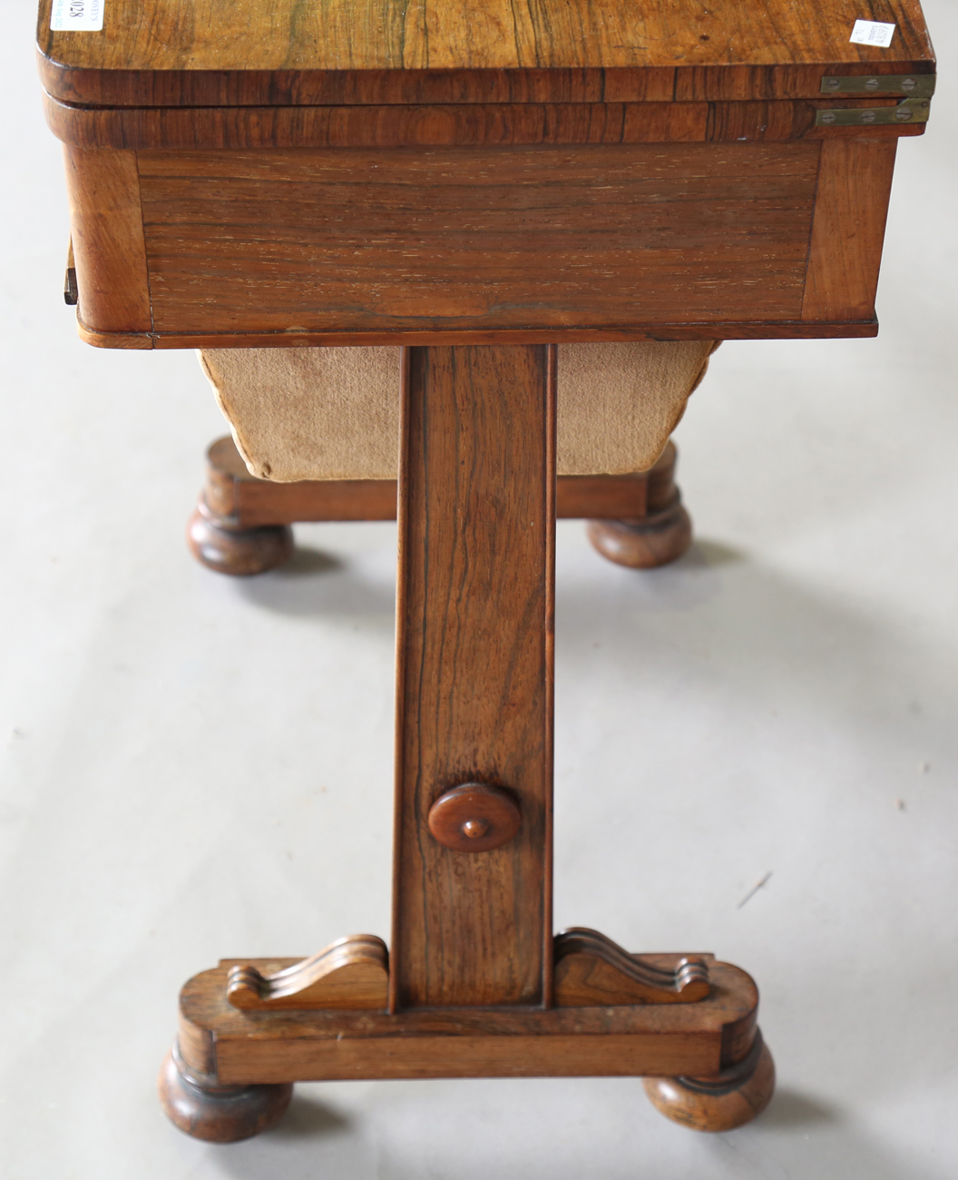 A Victorian rosewood work table, the top hinged to reveal a surface inset with leather above a - Image 11 of 11