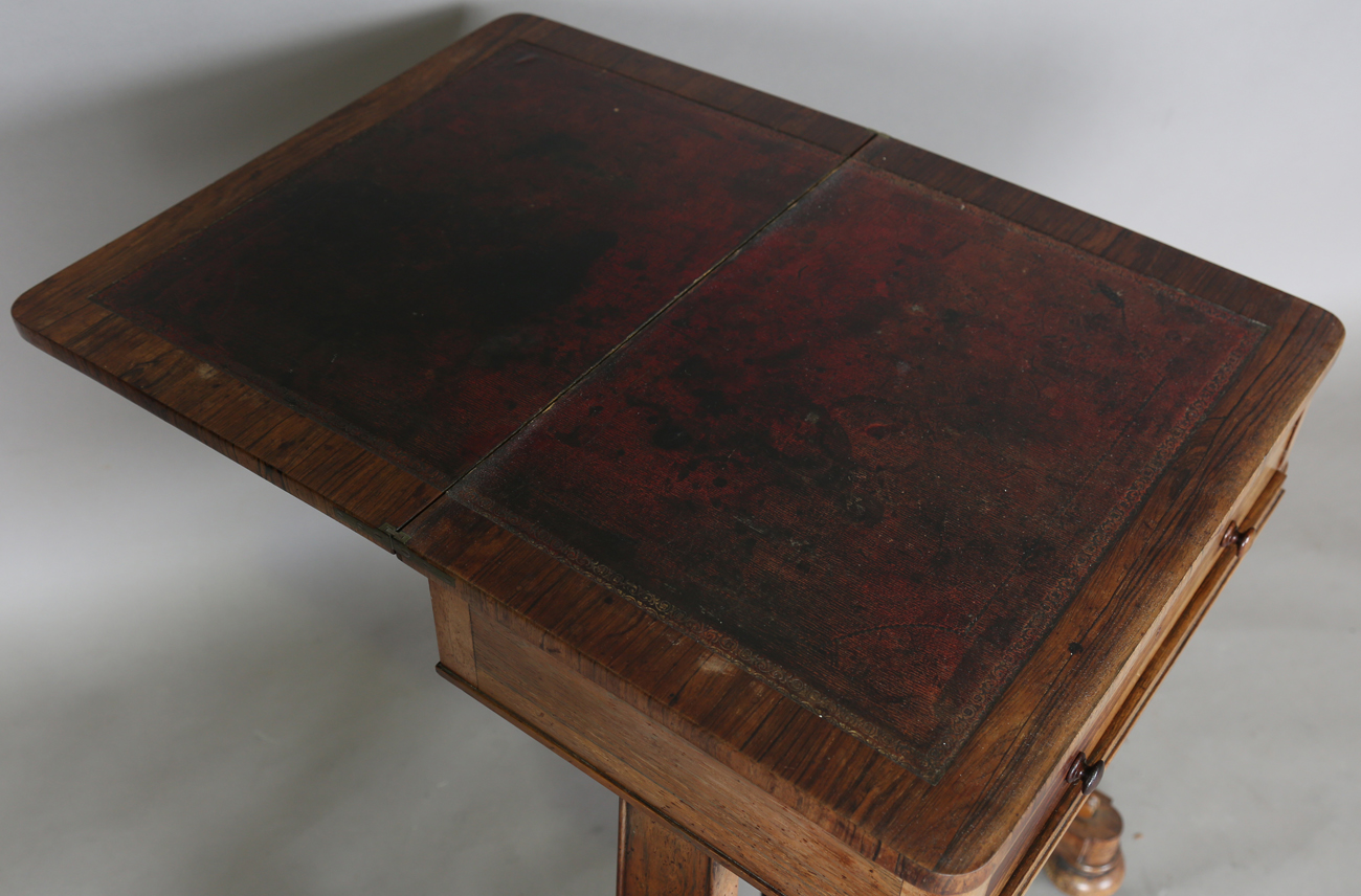 A Victorian rosewood work table, the top hinged to reveal a surface inset with leather above a - Image 4 of 11