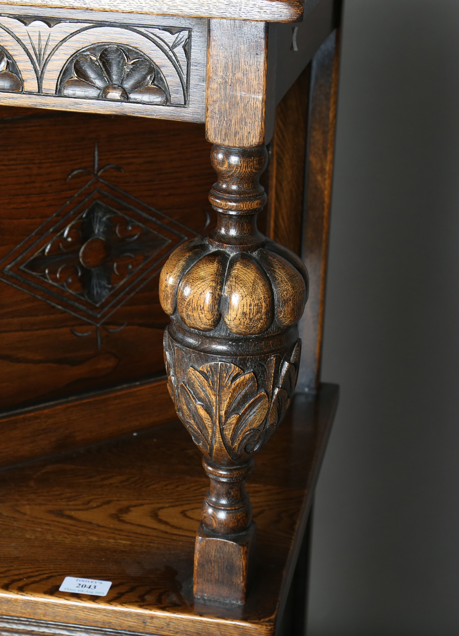 A 20th century Jacobean Revival oak court cupboard, height 134cm, width 122cm, depth 48cm.Buyer’s - Image 8 of 12