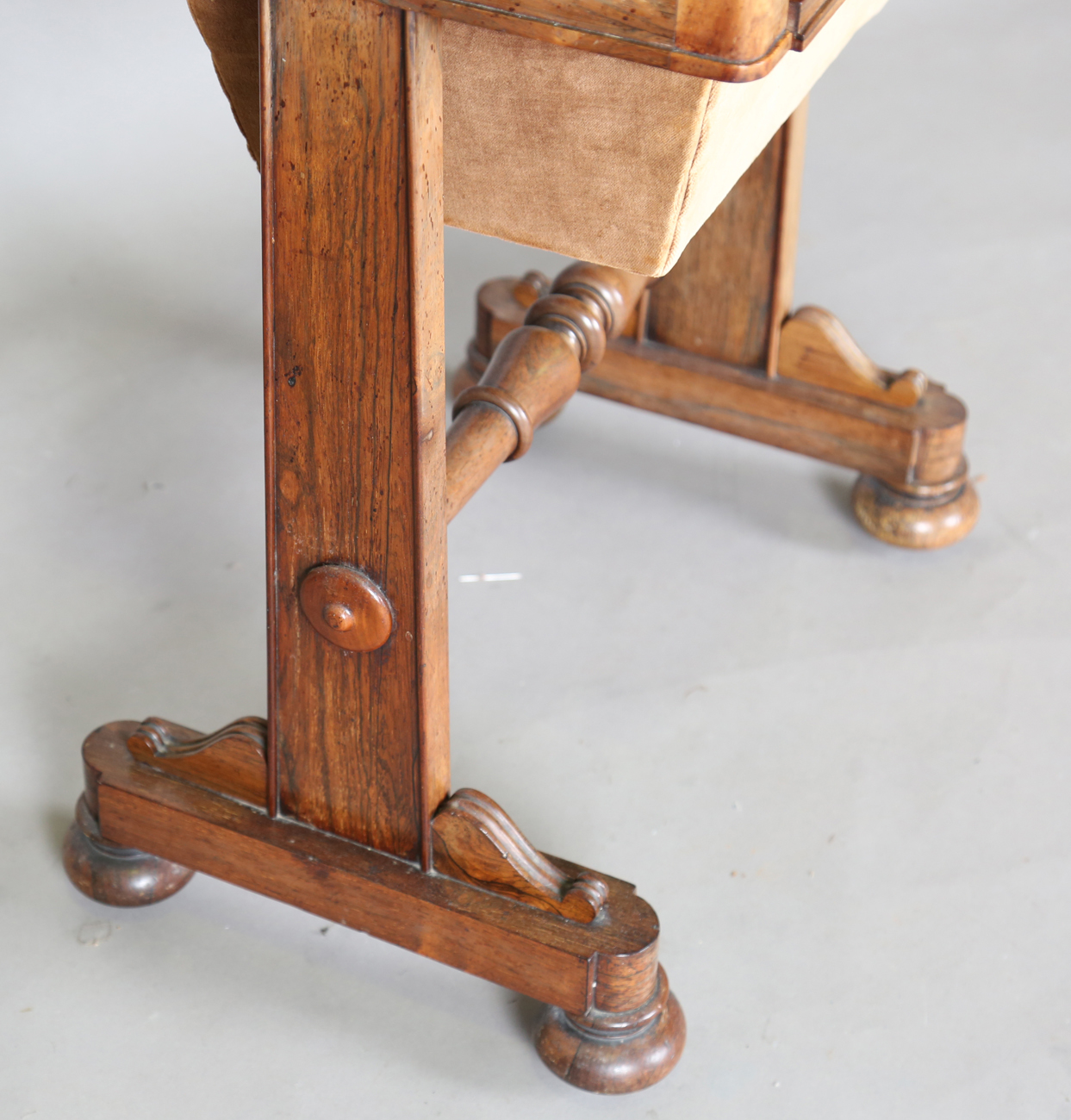 A Victorian rosewood work table, the top hinged to reveal a surface inset with leather above a - Image 9 of 11