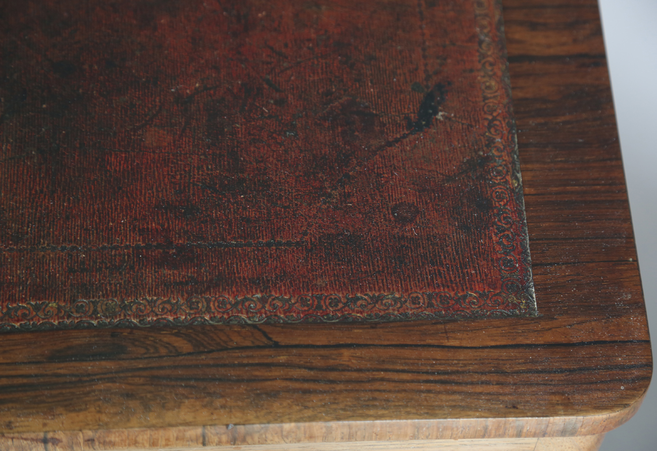 A Victorian rosewood work table, the top hinged to reveal a surface inset with leather above a - Image 5 of 11