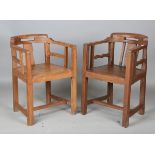 A near pair of Indian Colonial elm tub back chairs, height 75cm, width 53cm.Buyer’s Premium 29.4% (