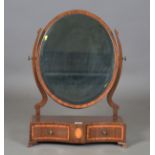 An Edwardian mahogany and satinwood crossbanded swing frame mirror, the base fitted with two