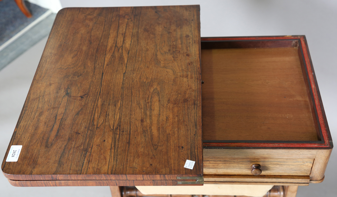 A Victorian rosewood work table, the top hinged to reveal a surface inset with leather above a - Image 6 of 11