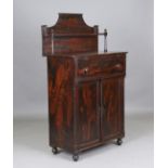 A mid-19th century American painted pine chiffonier, the scumbled surface imitating rosewood, fitted