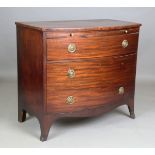An early Victorian mahogany bowfront chest of two drawers, fitted with a brushing slide, height