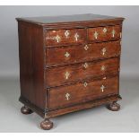 An 18th century provincial oak and walnut crossbanded chest of drawers, raised on bun feet, height