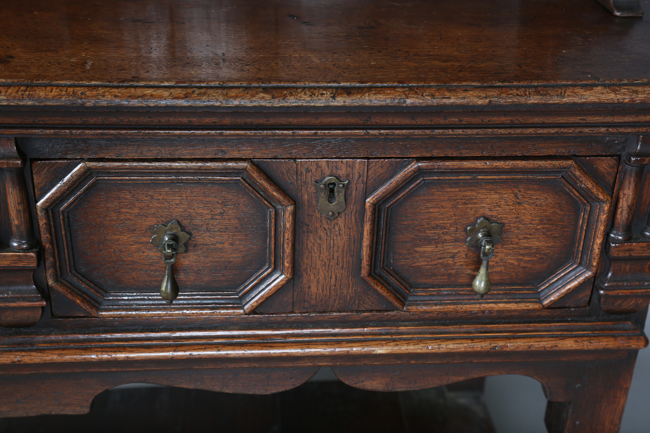 A 20th century William and Mary style oak dresser, the two drawers with applied geometric mouldings, - Image 6 of 13