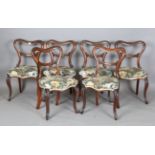 A set of six early Victorian rosewood spoon back dining chairs with cabriole legs, height 82cm,