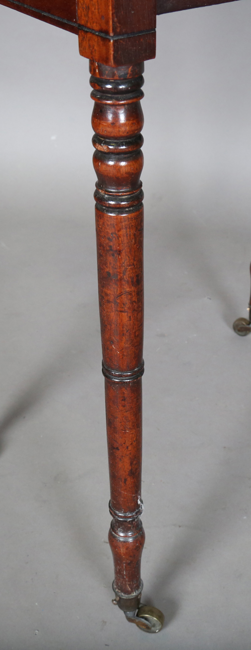 A Regency mahogany work table, fitted with two fall flaps and drawers, on ring turned legs and - Image 5 of 7