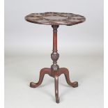 A 19th century George III style mahogany tripod tea table of small proportions, the top finely