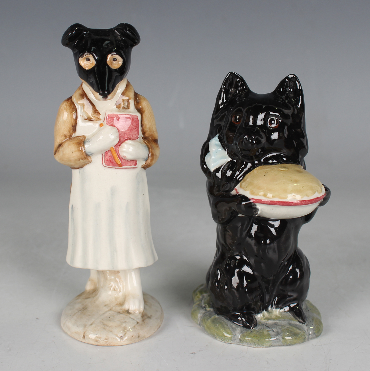 Two Beswick Beatrix Potter figures, comprising Duchess holding a pie and Pickles, both mark BP-3b,