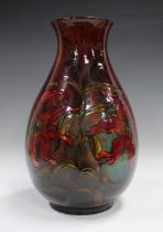 A large flambé Moorcroft Lily pattern vase, mid-20th century, of pear shape, impressed marks to base