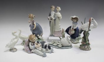 Seven Lladro figures, including Preening Crane, No. 1612, Hurry Now, No. 5503, Sweet Dreams, No.