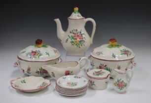 A collection of Keller & Guerin Luneville pottery tablewares, including two graduated vegetable