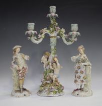 A Plaue porcelain floral encrusted four-light candelabrum, late 19th century, the stem applied