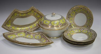 A small group of English porcelain, early 19th century, reserved with oval floral panels within gilt