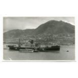 PHOTOGRAPHS. An album containing approximately 192 postcard-size photographs of shipping interest,
