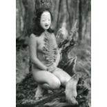 PHOTOGRAPHS. A group of 11 photographs of female nudes, all mid-20th century, 31cm x 22.5cm and