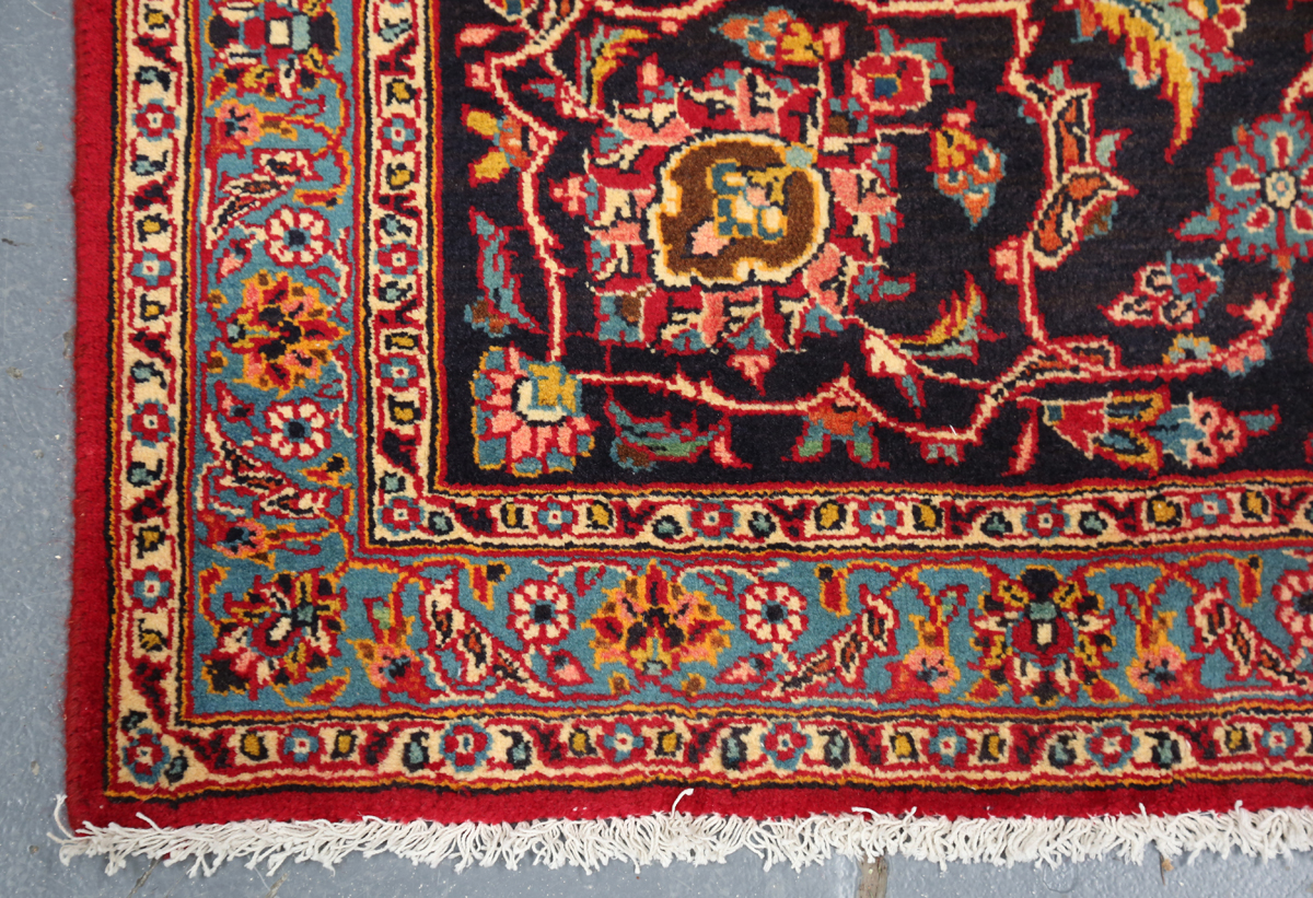 A Kashan carpet, Central Persia, mid/late 20th century, the red field with a shaped medallion, - Image 3 of 5