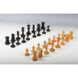 A late Victorian ebony and boxwood Staunton chess set, height of king 8cm, with original mahogany