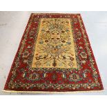 A Hamadan rug, North-west Persia, mid/late 20th century, the pale brown field with angular vines and