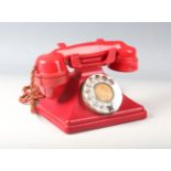 A rare G.P.O. 234 red Bakelite pyramid telephone, the underside detailed 'FH 34 234 No 162' and