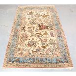An Esfahan pictorial rug, Central Persia, mid-20th century, the ivory field with an overall