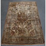A Qum part silk prayer rug, Central Persia, late 20th century, the ivory field with an ascending