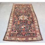 An Akstafa rug, South Caucasus, late 19th/early 20th century, the midnight blue field with a