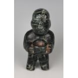 A pre-Columbian Olmec style carved variegated dark green hardstone stargazer figure, possibly 900-