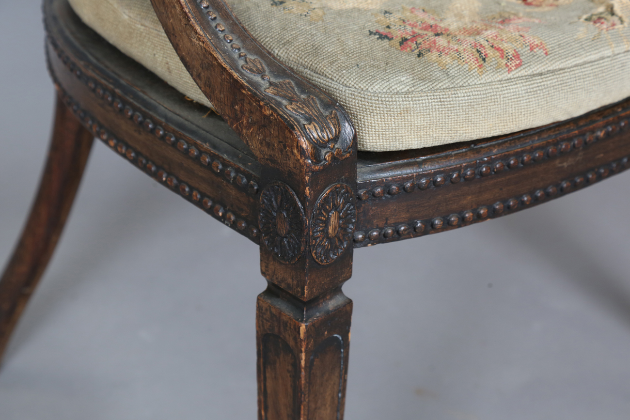 A late George III Neoclassical walnut framed elbow chair with a beaded frame and caned seat, - Image 4 of 11