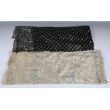 An early 20th century Egyptian Assuit cream net and silver appliqué shawl, decorated with overall