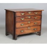 A George III mahogany bachelor's chest of four graduated oak-lined drawers with original brass