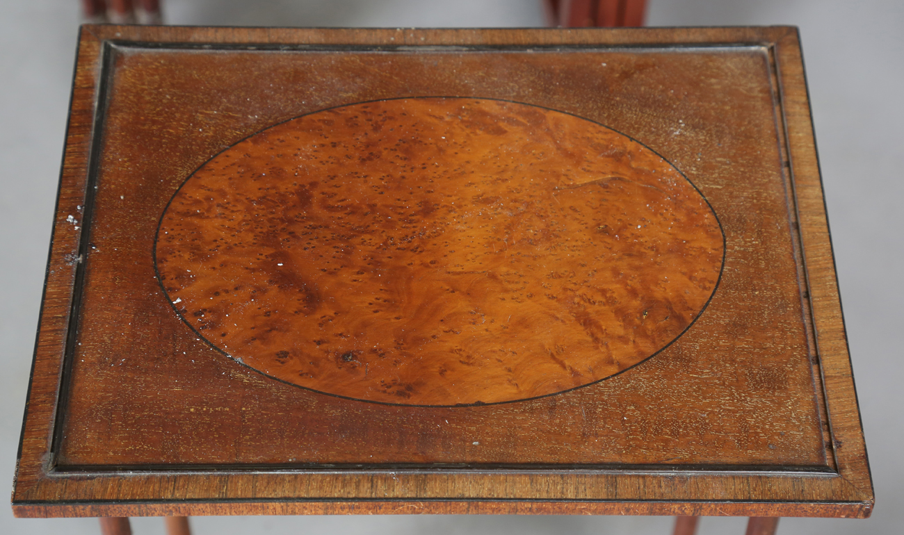 An Edwardian mahogany quartetto nest of occasional tables, each with an oval amboyna reserve and - Image 2 of 6