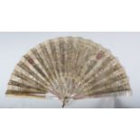 A late 18th/early 19th century mother-of-pearl folding fan, the net panel with silver and gilt