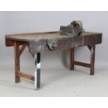 An early/mid-20th century pine work bench, fitted with a Record No. 25 vice and a Record No. 52 1/