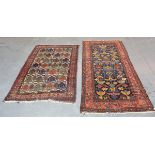 A Hamadan rug, North-west Persia, mid-20th century, the charcoal field with overall palmettes,
