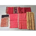 A quantity of mainly Indian fabric, including woven shawls and block printed cotton panels.Buyer’s