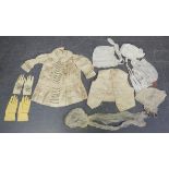 A selection of 19th century and later clothing, including a cream silk child's tunic with silver