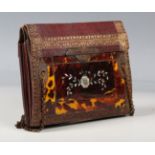 A George III tortoiseshell and mother-of-pearl inlaid double-sided purse with applied gilt-tooled