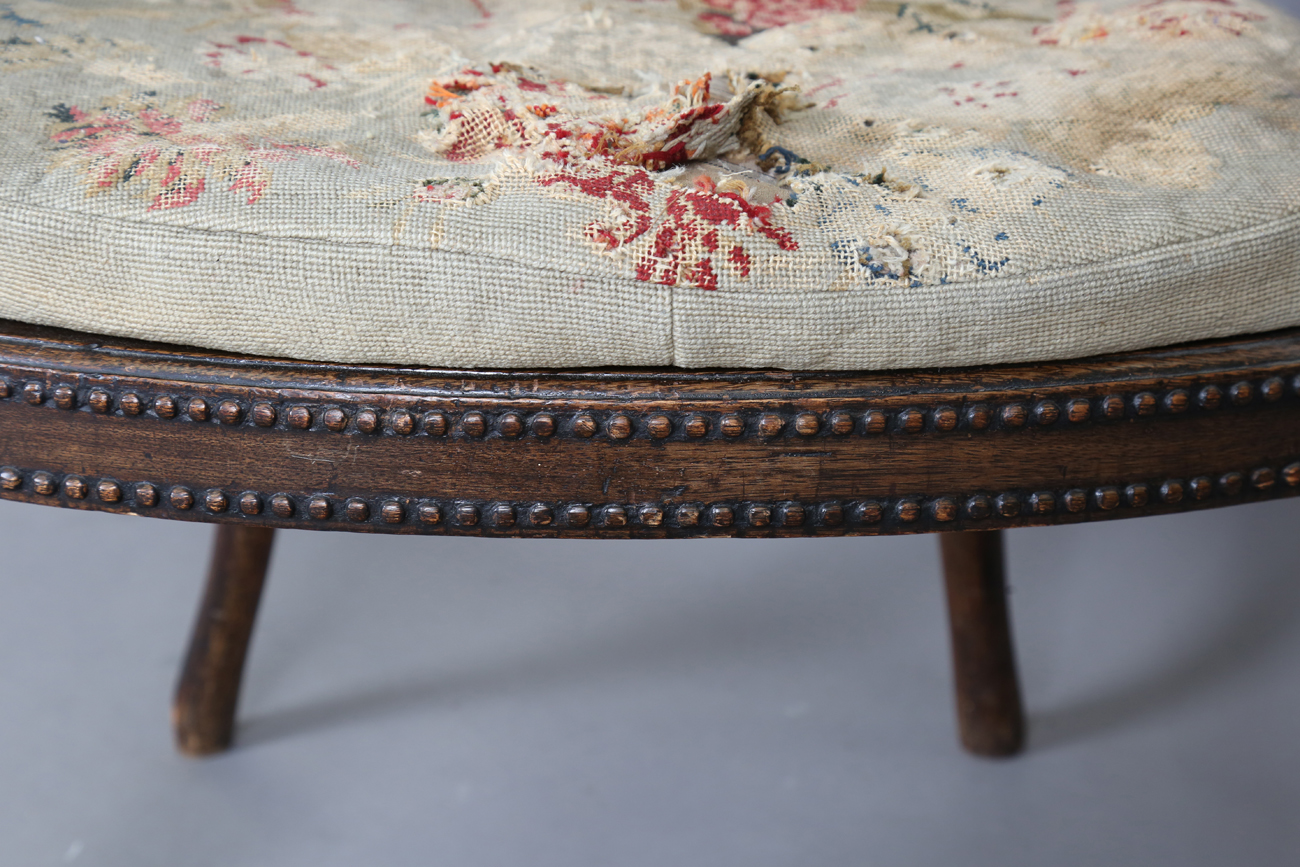 A late George III Neoclassical walnut framed elbow chair with a beaded frame and caned seat, - Image 2 of 11