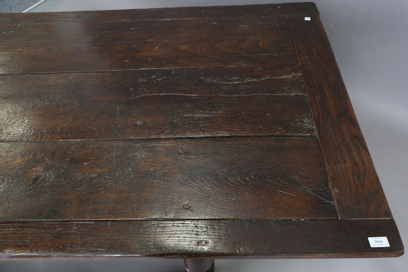 A 17th century style oak refectory table, raised on turned and block legs, height 73cm, length - Image 6 of 8