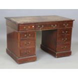 An early 20th century mahogany twin pedestal desk, fitted with arrangement of drawers, height