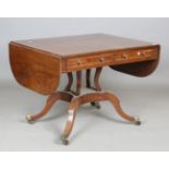 A 19th century mahogany sofa table with boxwood inlay, fitted with two frieze drawers and opposing