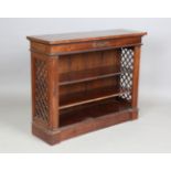 A late 20th century hardwood open bookcase with open lattice sides, height 85cm, width 107cm,