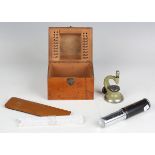 A collection of watchmaker's tools and scientific instruments, including a Star staking tool set,